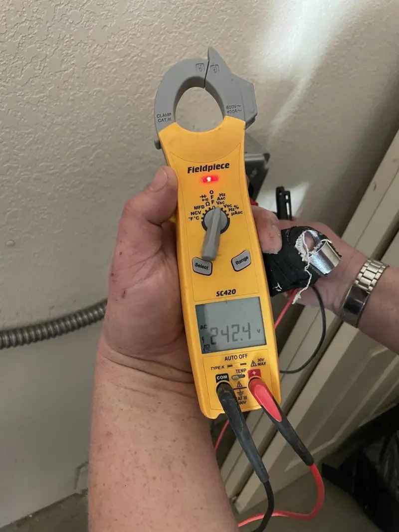 Voltage testing with clamp meter during Aluminum Wiring Replacement in Johnston